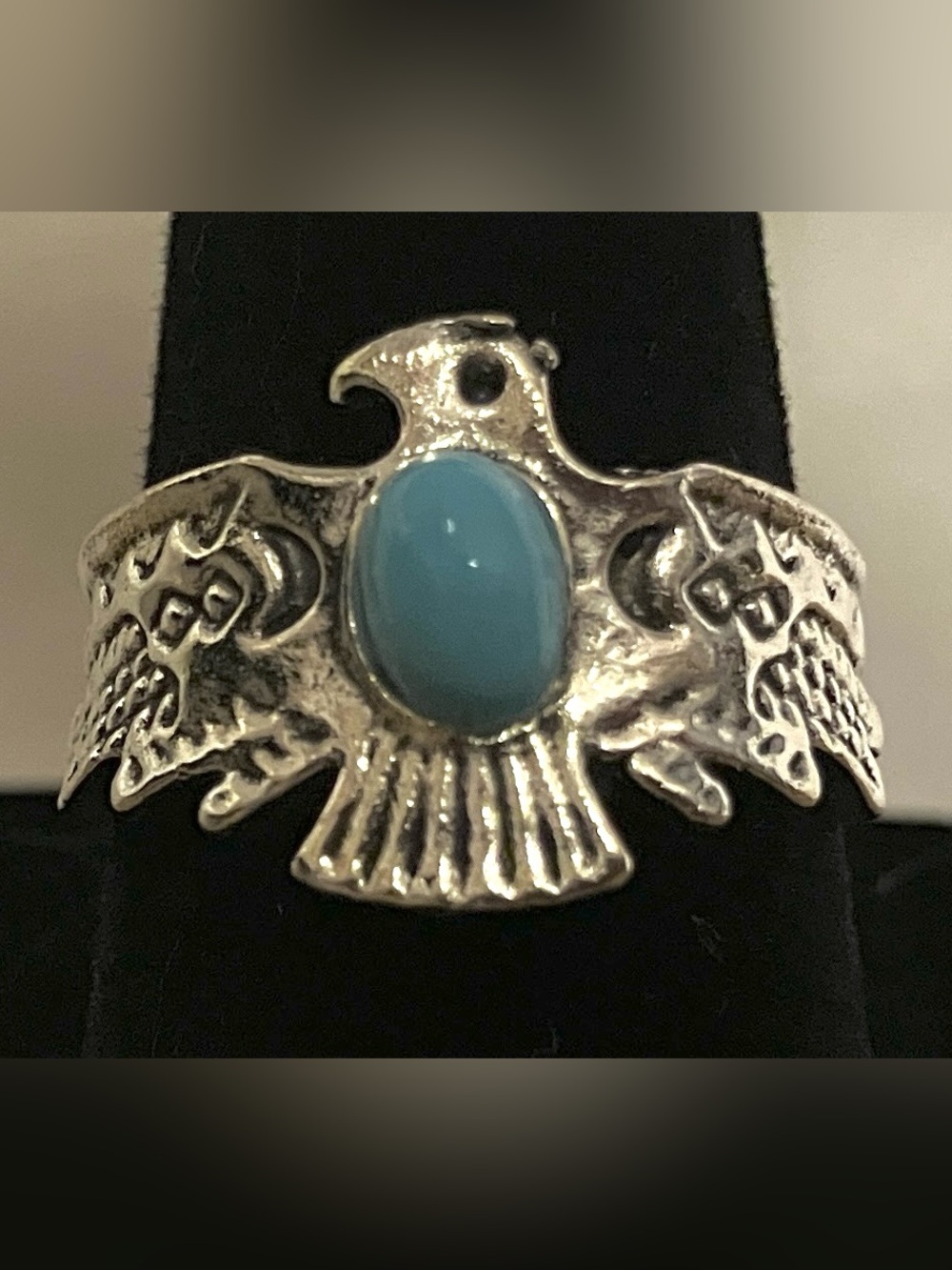 Silver Thunderbird Pendant with Turquoise Stone